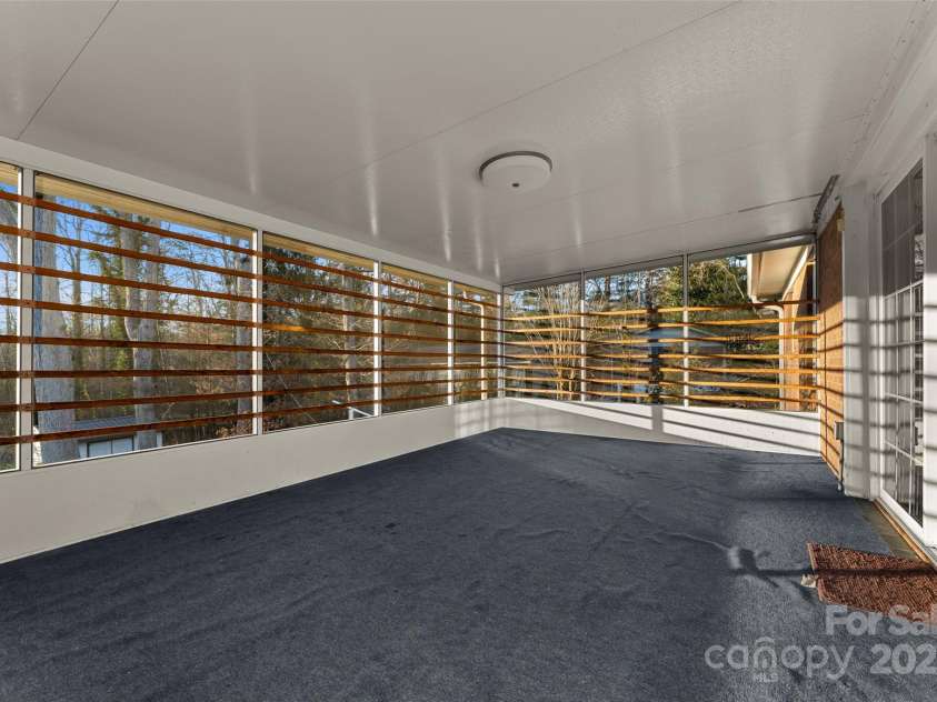 123 Castleton Lane, Hendersonville, NC 28791.  MLS# CAR4237756, YatesRealty ID 2754. Screened porch