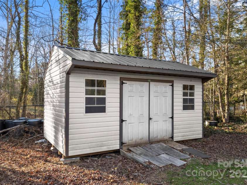 123 Castleton Lane, Hendersonville, NC 28791.  MLS# CAR4237756, YatesRealty ID 2754. Storage building