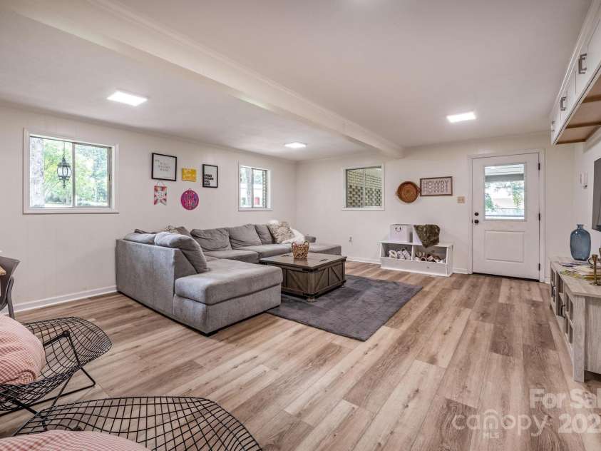 411 Saint Andrews Road, Statesville, NC 28625.  MLS# CAR4266848, YatesRealty ID 27540. Main level rec room