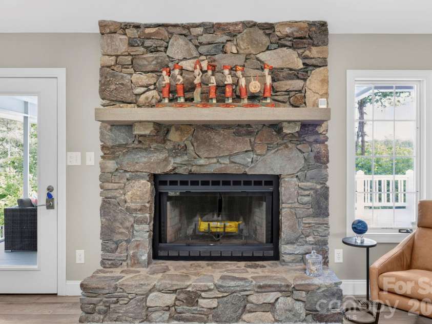 152 Skyview Circle, Asheville, NC 28804.  MLS# CAR4384126, YatesRealty ID 27544. Floor to ceiling stone fireplace