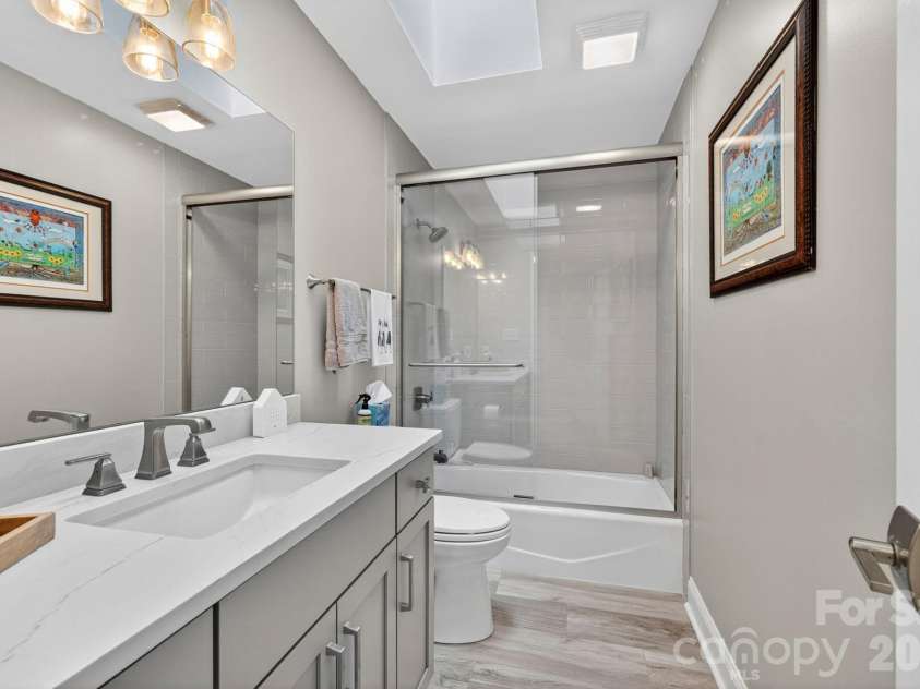 152 Skyview Circle, Asheville, NC 28804.  MLS# CAR4384126, YatesRealty ID 27544. Guest bathroom