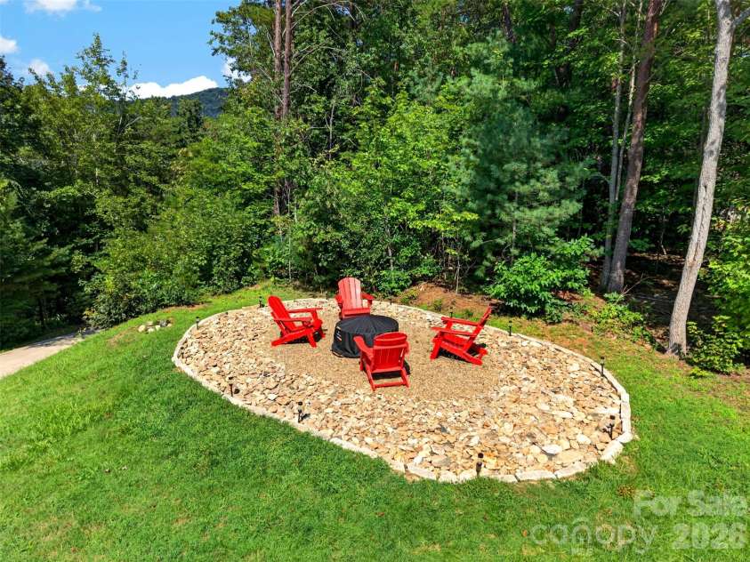 152 Skyview Circle, Asheville, NC 28804.  MLS# CAR4384126, YatesRealty ID 27544. New firepit area for enjoying evenings outside.