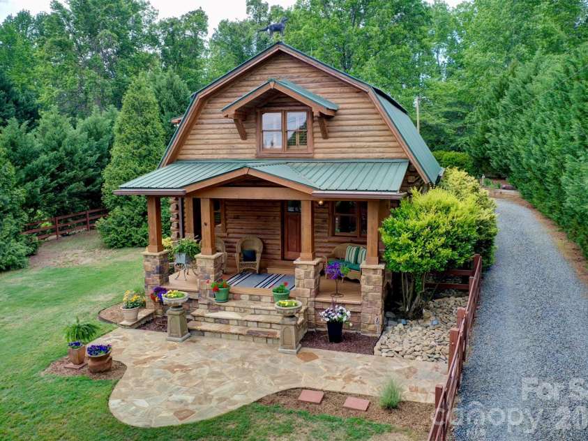15425 Rocky River Road, Davidson, NC 28036.  MLS# CAR4382327, YatesRealty ID 27548. Private drive leads to rear-facing garage