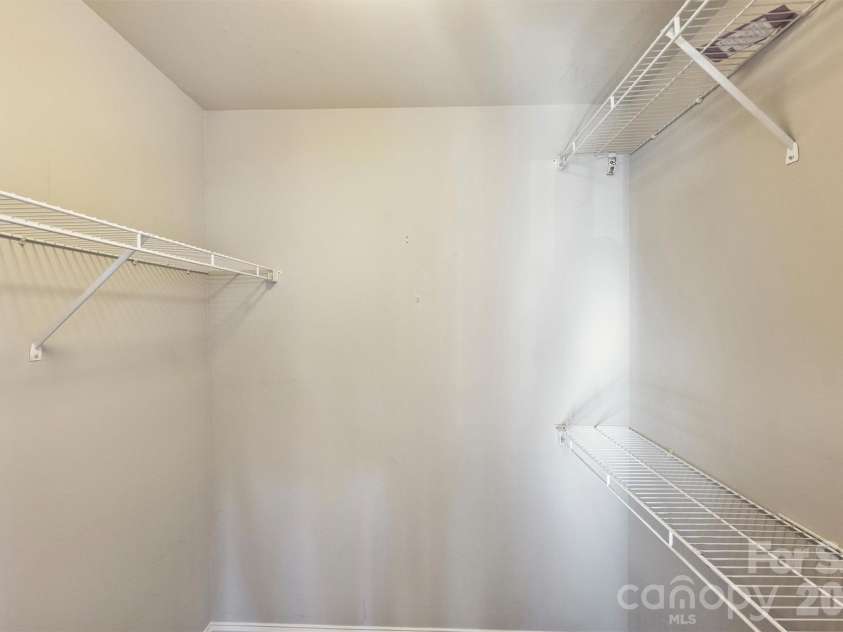1144 1st Street, Charlotte, NC 28202.  MLS# CAR4336221, YatesRealty ID 2755. Large Walk In Closet - Primary Bedroom