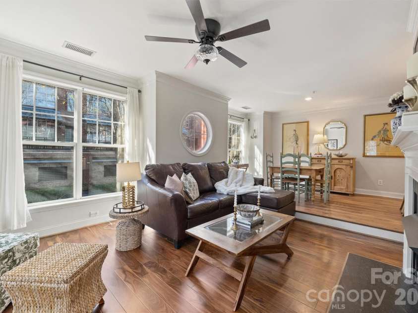 1144 1st Street, Charlotte, NC 28202.  MLS# CAR4336221, YatesRealty ID 2755. Windows galore in this gorgeous corner unit - walk to coffee & Panters Stadium!