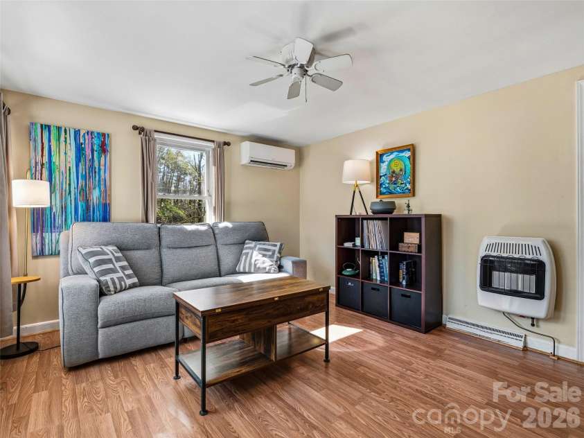 125 Lower Edgewood Road, Candler, NC 28715.  MLS# CAR4371013, YatesRealty ID 27557. Beautiful living room with plenty of natural light!