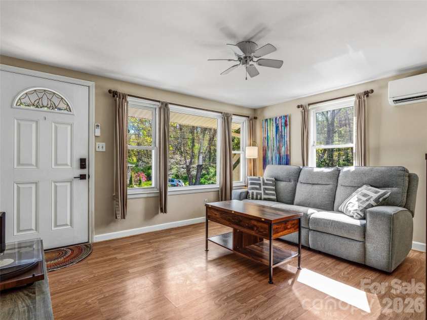 125 Lower Edgewood Road, Candler, NC 28715.  MLS# CAR4371013, YatesRealty ID 27557. Beautiful living room with plenty of natural light!