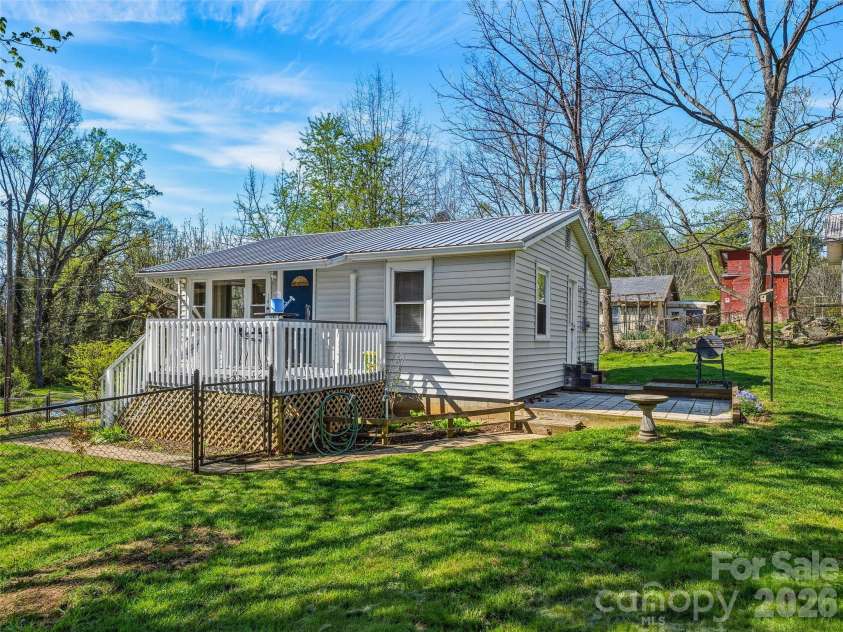 125 Lower Edgewood Road, Candler, NC 28715.  MLS# CAR4371013, YatesRealty ID 27557. Beautiful setting on a flat corner lot!