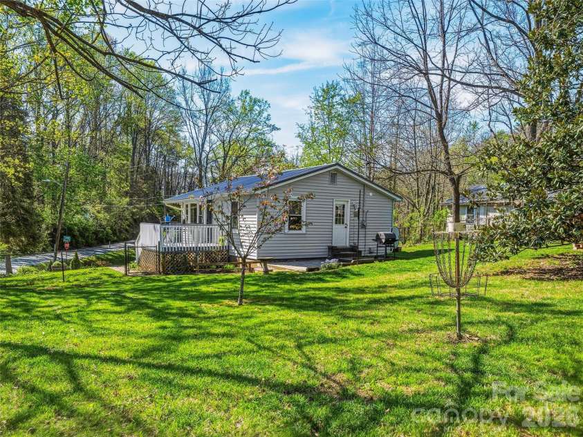 125 Lower Edgewood Road, Candler, NC 28715.  MLS# CAR4371013, YatesRealty ID 27557. Beautiful setting on a flat corner lot!