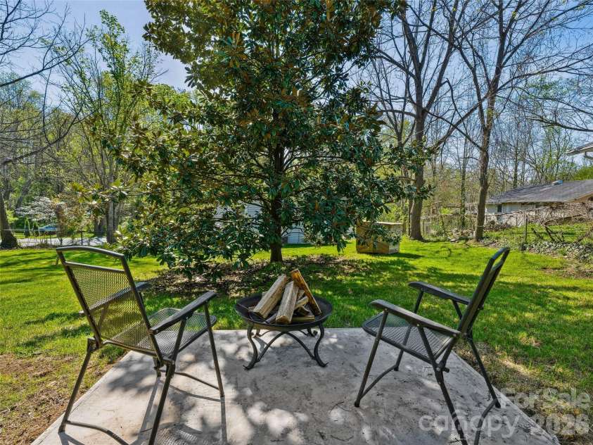 125 Lower Edgewood Road, Candler, NC 28715.  MLS# CAR4371013, YatesRealty ID 27557. Quaint area for a campfire.
