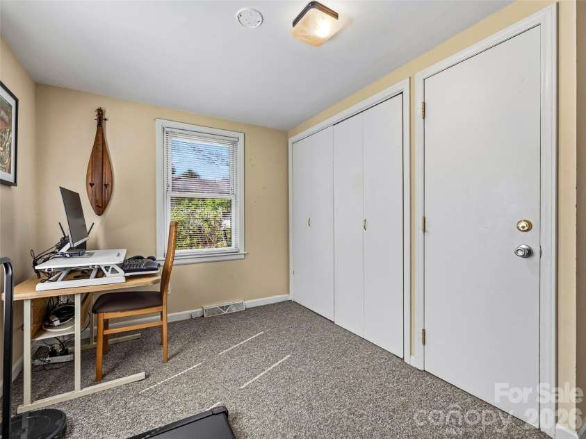 125 Lower Edgewood Road, Candler, NC 28715.  MLS# CAR4371013, YatesRealty ID 27557. Second bedroom currently used as an office.