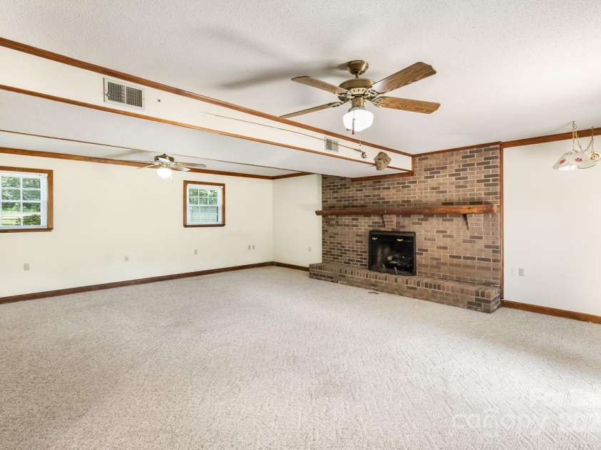 12003 Old Beatty Ford Road, Rockwell, NC 28138.  MLS# CAR4276621, YatesRealty ID 27562. Basement family room