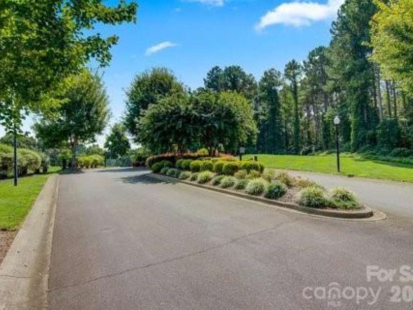 111 Lakefront Drive, Connelly Springs, NC 28612.  MLS# CAR4382990, YatesRealty ID 27563. Front entrance with gates