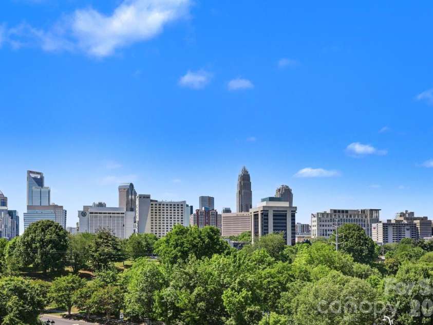 1100 Metropolitan Avenue, Charlotte, NC 28204.  MLS# CAR4378090, YatesRealty ID 27565. 1100 Metropolitan Ave-Unit 413 with stunning top floor views of uptown Charlotte