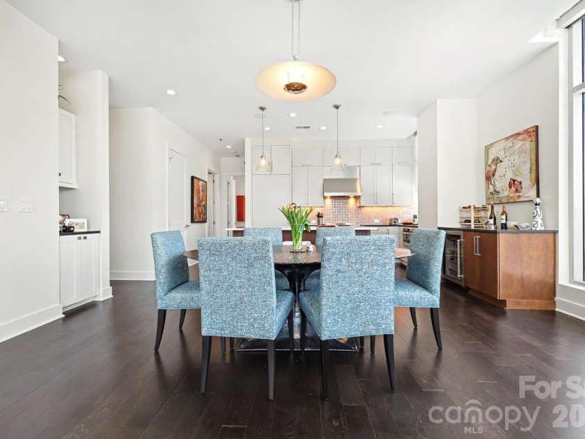 1100 Metropolitan Avenue, Charlotte, NC 28204.  MLS# CAR4378090, YatesRealty ID 27565. Custom lightting for dining and bar area with beverage refrigerator