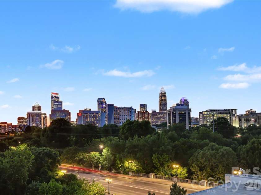 1100 Metropolitan Avenue, Charlotte, NC 28204.  MLS# CAR4378090, YatesRealty ID 27565. Twilight views