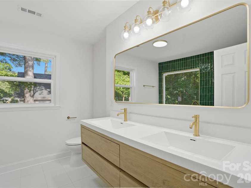 9212 Plashet Lane, Mint Hill, NC 28227.  MLS# CAR4383921, YatesRealty ID 27573. Primary bathroom with floating vanity
