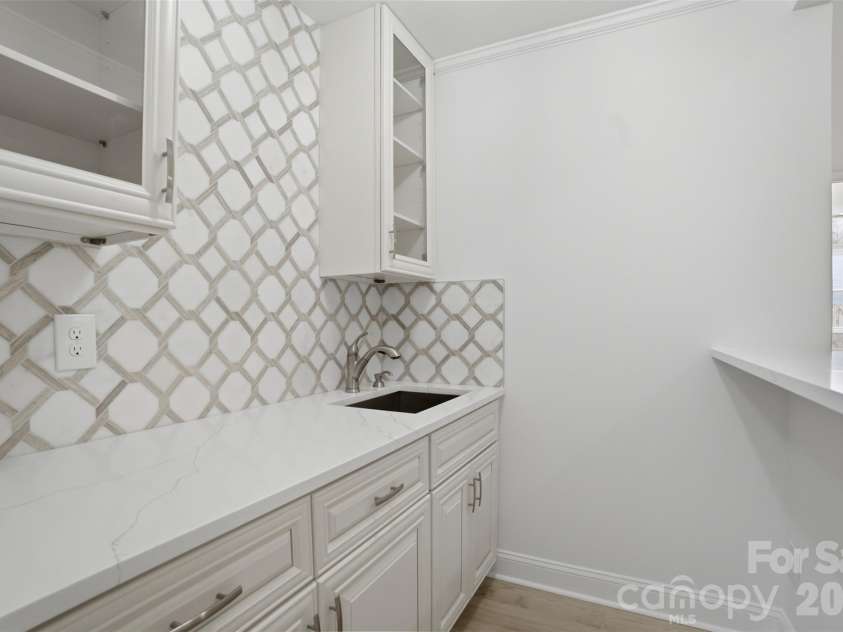 9212 Plashet Lane, Mint Hill, NC 28227.  MLS# CAR4383921, YatesRealty ID 27573. Wet Bar with Marble Backspash