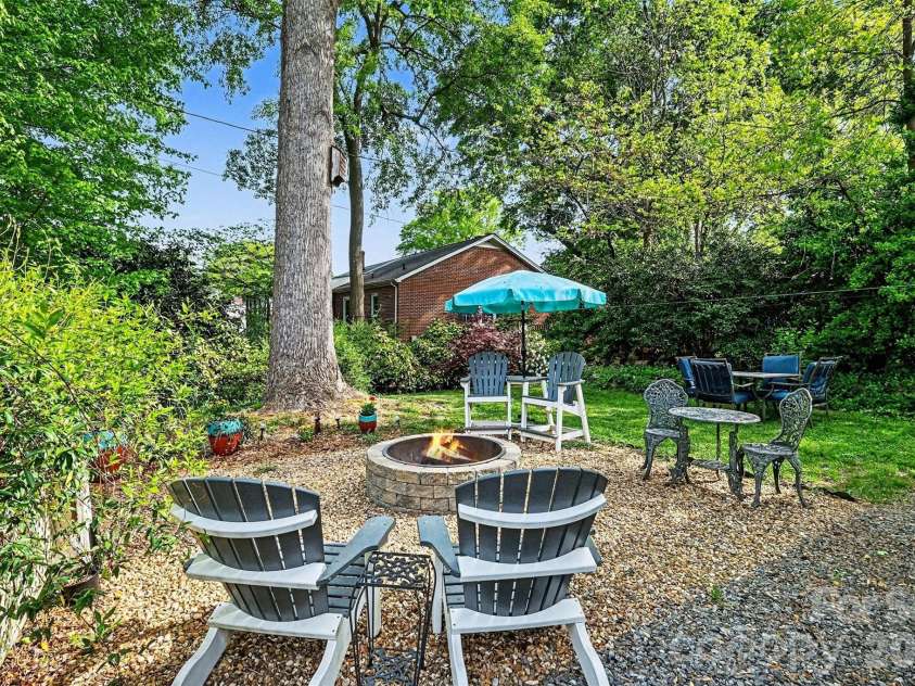 720 Sumter Street, Shelby, NC 28150.  MLS# CAR4367806, YatesRealty ID 27575. ...with a fire pit...