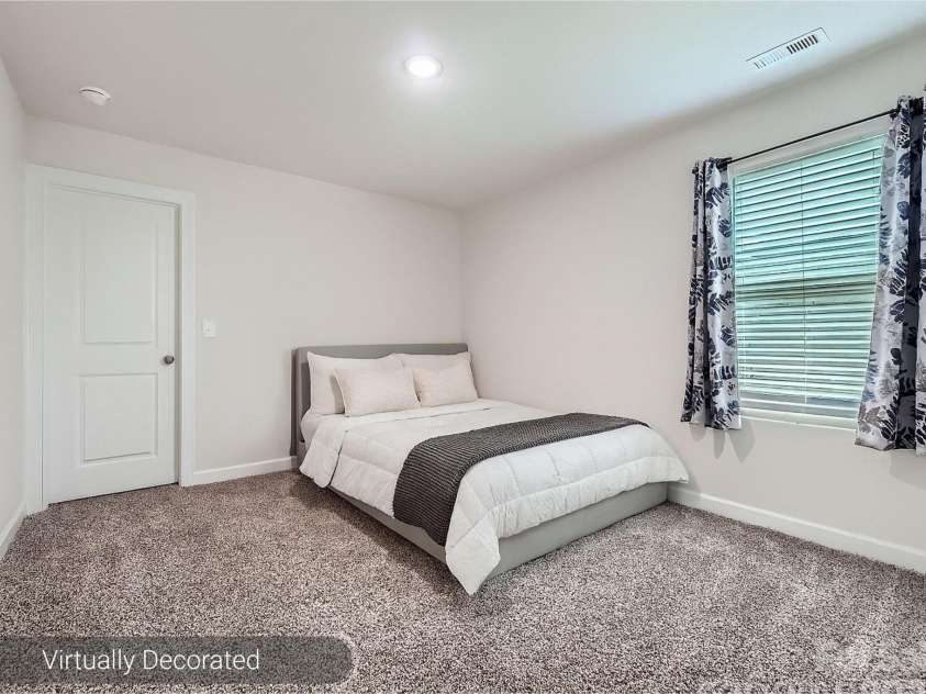 1041 Red Apple Street, Monroe, NC 28110.  MLS# CAR4283878, YatesRealty ID 27576. Bedroom 1 - Virtually Decorated