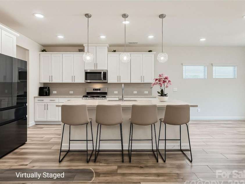 1041 Red Apple Street, Monroe, NC 28110.  MLS# CAR4283878, YatesRealty ID 27576. Kitchen - Virtually Staged