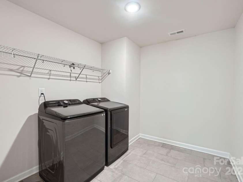 1041 Red Apple Street, Monroe, NC 28110.  MLS# CAR4283878, YatesRealty ID 27576. Laundry Room