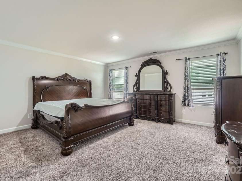 1041 Red Apple Street, Monroe, NC 28110.  MLS# CAR4283878, YatesRealty ID 27576. Primary Bedroom