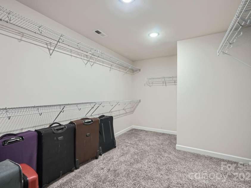 1041 Red Apple Street, Monroe, NC 28110.  MLS# CAR4283878, YatesRealty ID 27576. Primary Walk-in Closet