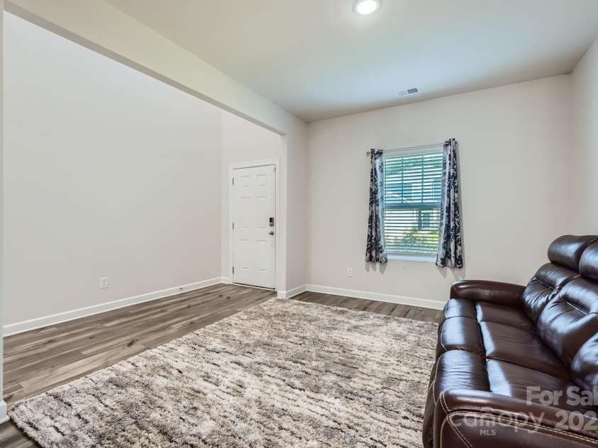 1041 Red Apple Street, Monroe, NC 28110.  MLS# CAR4283878, YatesRealty ID 27576. Sitting Area / Formal Dining