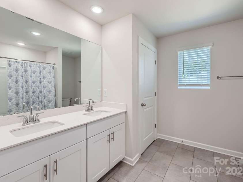 1041 Red Apple Street, Monroe, NC 28110.  MLS# CAR4283878, YatesRealty ID 27576. Upstairs Full Bath