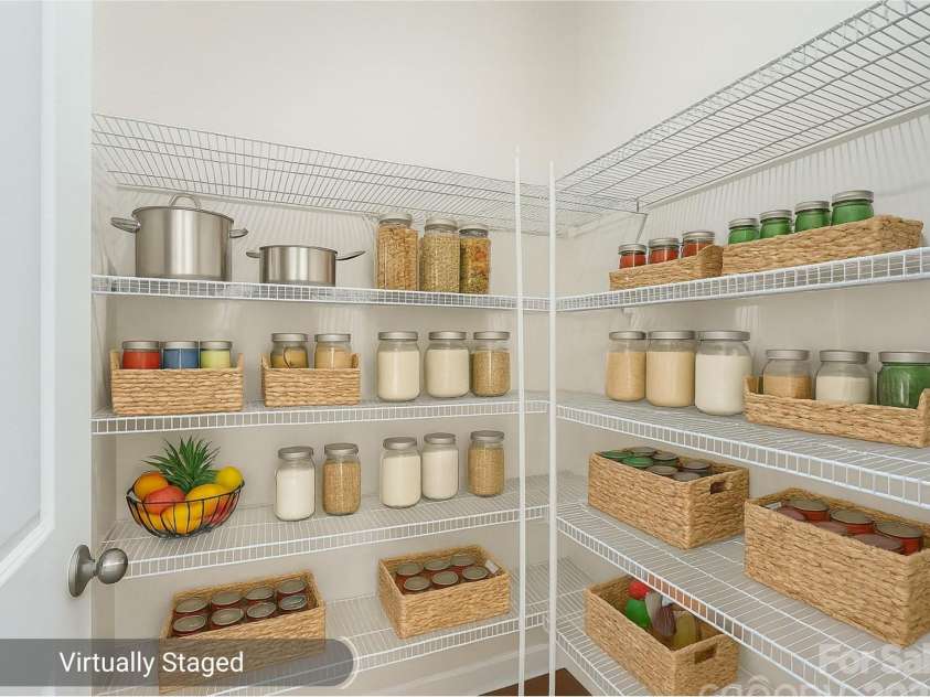 1041 Red Apple Street, Monroe, NC 28110.  MLS# CAR4283878, YatesRealty ID 27576. Walk-in Pantry - Virtually Staged