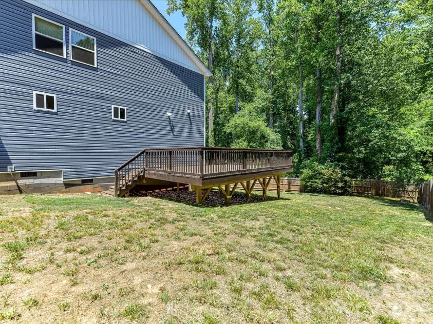 2369 Glenwood Street, Kannapolis, NC 28083.  MLS# CAR4384660, YatesRealty ID 27579. Side yard