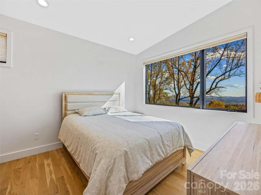 15 Laurel Ledge Way, Fletcher, NC 28732.  MLS# CAR4316029, YatesRealty ID 2758. Bedroom 2 upstairs. Southern views!