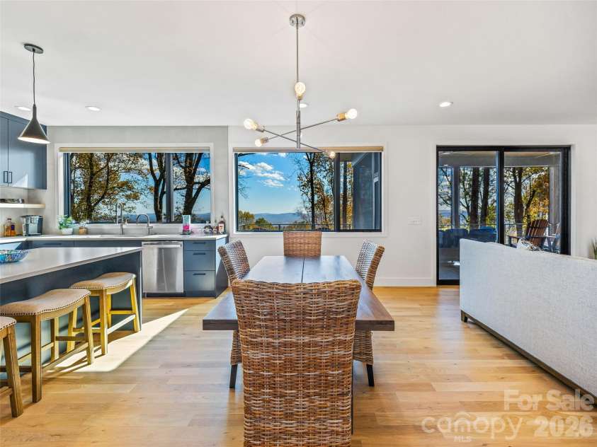 15 Laurel Ledge Way, Fletcher, NC 28732.  MLS# CAR4316029, YatesRealty ID 2758. Kitchen, dining, and living room with the open floor plan.