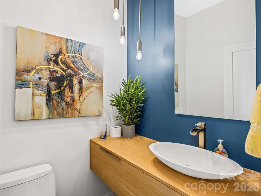 15 Laurel Ledge Way, Fletcher, NC 28732.  MLS# CAR4316029, YatesRealty ID 2758. Main level powder room for all your guests.