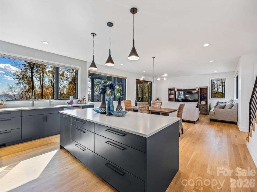 15 Laurel Ledge Way, Fletcher, NC 28732.  MLS# CAR4316029, YatesRealty ID 2758. Never lose sight of your guests from the kitchen all the way to the living room and deck!