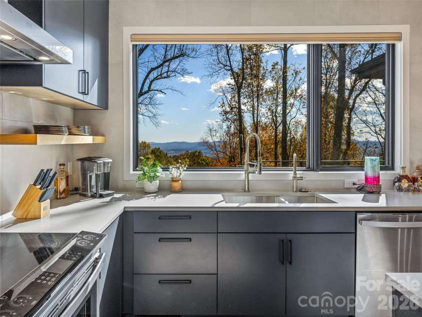 15 Laurel Ledge Way, Fletcher, NC 28732.  MLS# CAR4316029, YatesRealty ID 2758. Not a bad thing to see while washing the dishes, huh?