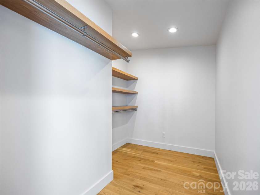 15 Laurel Ledge Way, Fletcher, NC 28732.  MLS# CAR4316029, YatesRealty ID 2758. Plenty of space in the primary suite's walk in closet.