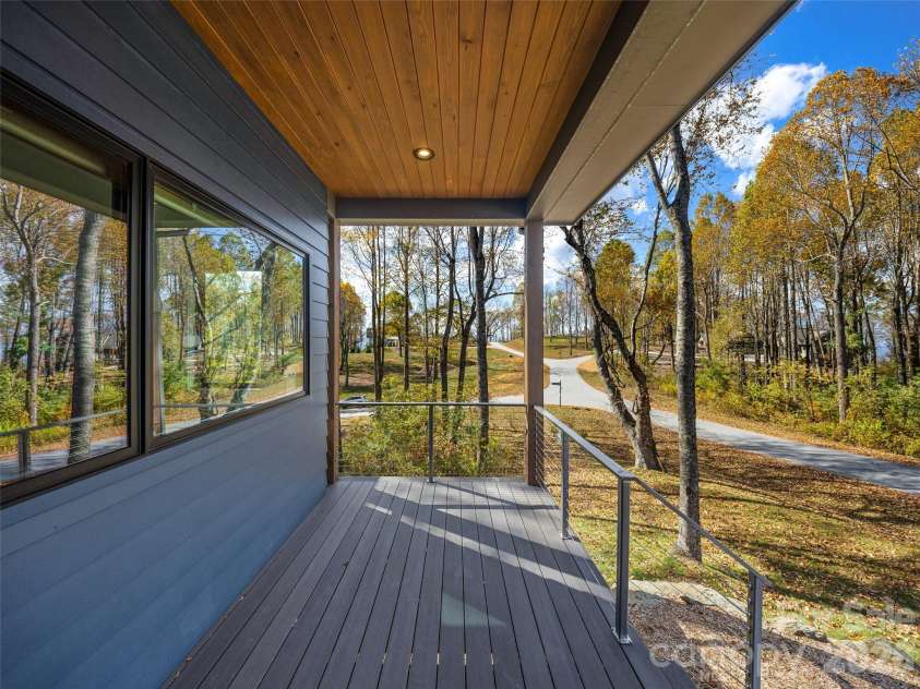 15 Laurel Ledge Way, Fletcher, NC 28732.  MLS# CAR4316029, YatesRealty ID 2758. Room for a rocking chair on the covered front porch.