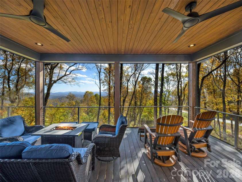15 Laurel Ledge Way, Fletcher, NC 28732.  MLS# CAR4316029, YatesRealty ID 2758. Sip your favorite beverage all year round and enjoy the firepit when the temps dip.