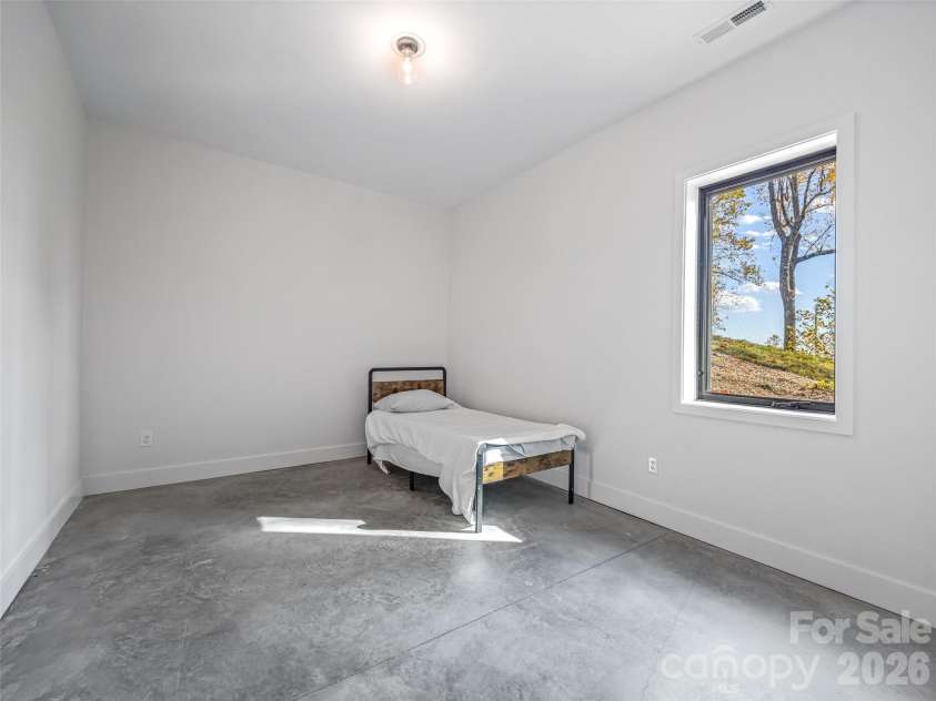 15 Laurel Ledge Way, Fletcher, NC 28732.  MLS# CAR4316029, YatesRealty ID 2758. Terrace level suite with walk in closet.