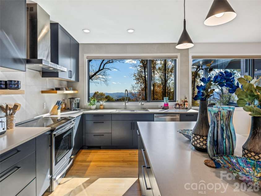 15 Laurel Ledge Way, Fletcher, NC 28732.  MLS# CAR4316029, YatesRealty ID 2758. Tons of counter space with the center island.