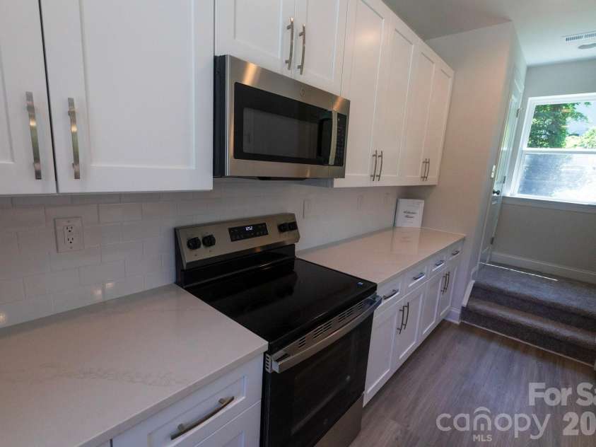209 James Street, Kannapolis, NC 28083.  MLS# CAR4384719, YatesRealty ID 27580. Extra storage closets by stairs