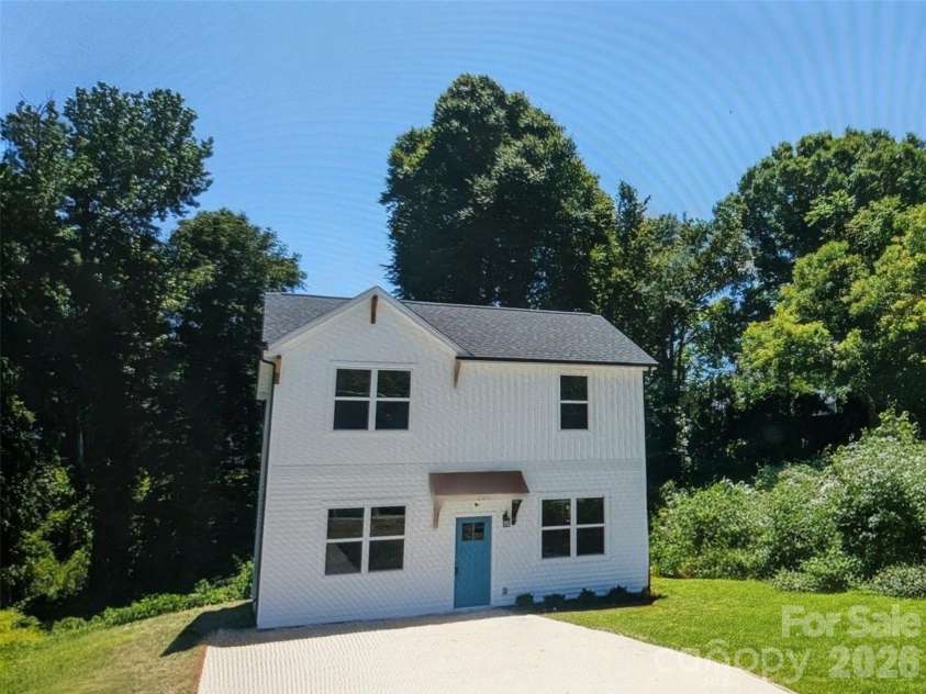 209 James Street, Kannapolis, NC 28083.  MLS# CAR4384719, YatesRealty ID 27580. House sits back for privacy. Lots of parking in concrete driveway