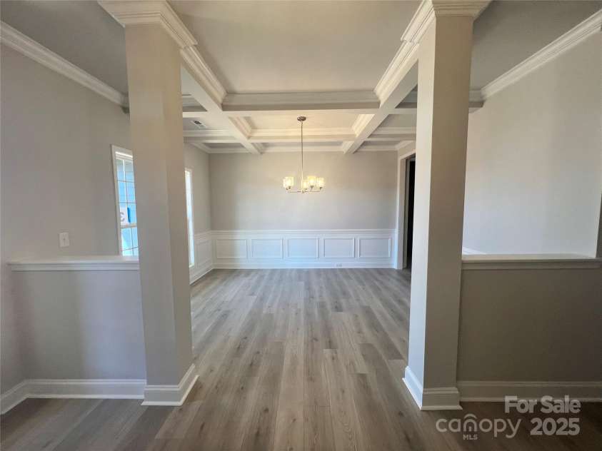 147 Honey Lotus Lane, Statesville, NC 28625.  MLS# CAR4284542, YatesRealty ID 27582. Dining room with Coffered ceilings