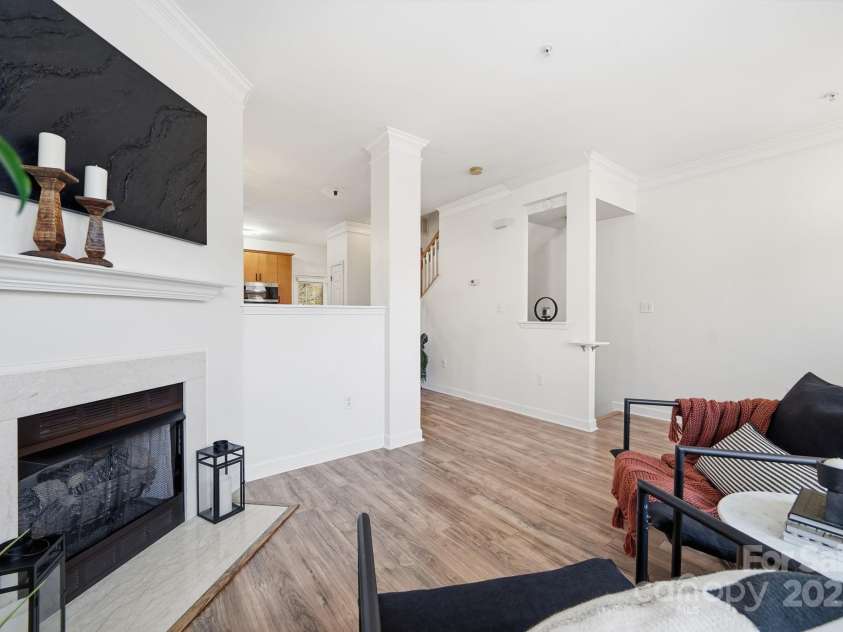 7119 Founders Club Court, Charlotte, NC 28269.  MLS# CAR4317437, YatesRealty ID 2759. Electric fireplace in living room