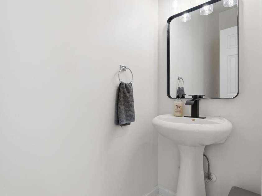 7119 Founders Club Court, Charlotte, NC 28269.  MLS# CAR4317437, YatesRealty ID 2759. Powder bath on main floor