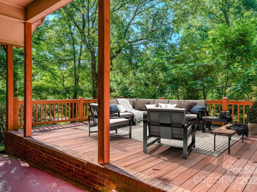 17 Sitar Lane, Saluda, NC 28773.  MLS# CAR4284532, YatesRealty ID 27590. This deck is virtually staged