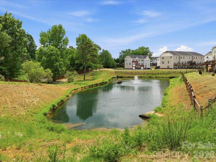 2527 Grantham Place Drive, Fort Mill, SC 29715.  MLS# CAR4374538, YatesRealty ID 27592. Pond