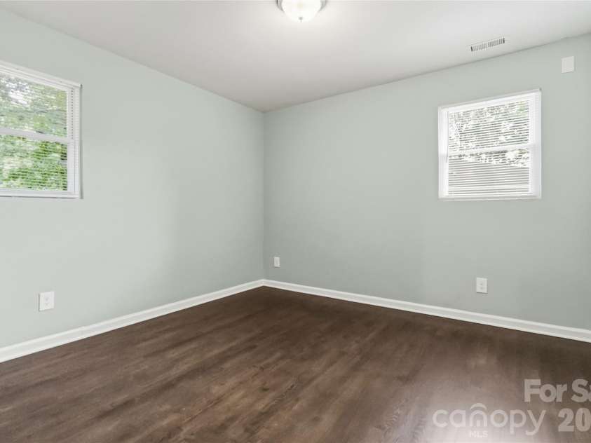 1248 Rosada Drive, Charlotte, NC 28213.  MLS# CAR4386862, YatesRealty ID 27594. Primary Bedroom with a half bathroom